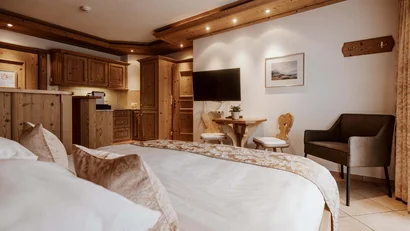 Cozy hotel room with wooden furniture and modern amenities