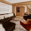 Cozy living room with wooden furniture and warm tones